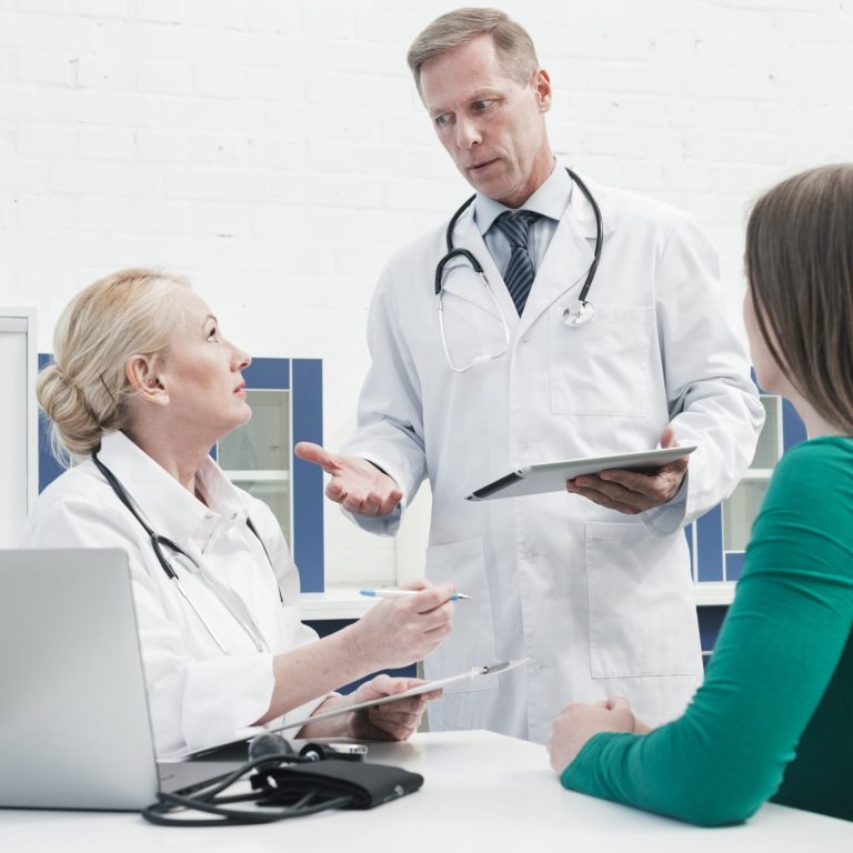 doctor-tending-patient-min